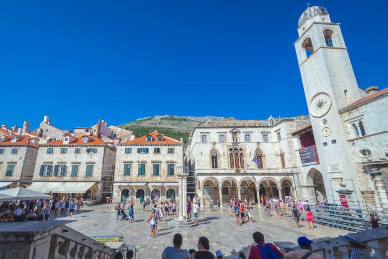 See the Clock Tower in Luza Square in Dubrovnik